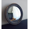 Miroir convexe style antique noir patine or